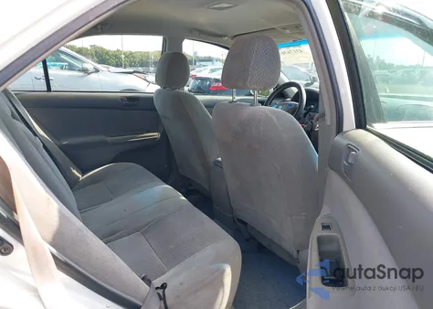 2002 Toyota Camry Le from USA, damaged, VIN 4T1BE32K62U063797